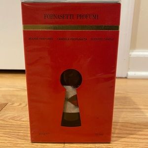 Original packaging: Fornasetti Labbra Candle